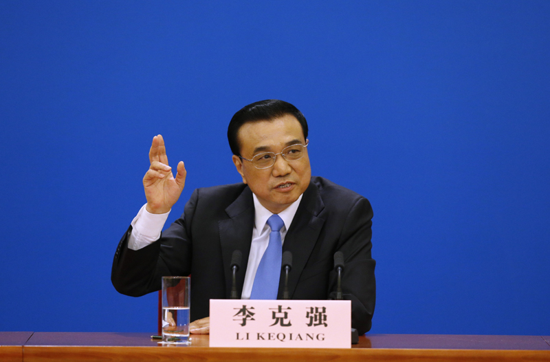 3月15日，國務(wù)院總理李克強(qiáng)在北京人民大會(huì)堂與中外記者見面，并回答記者提問。 新華社記者 沈伯韓 攝