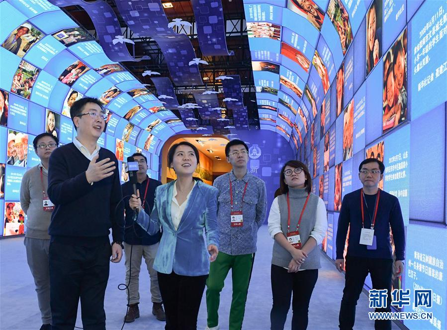 （圖文互動(dòng)）（3）筆墨書(shū)崢嶸 光影繪壯美&mdash;&mdash;慶祝改革開(kāi)放40周年大型展覽新華社展項(xiàng)掃描