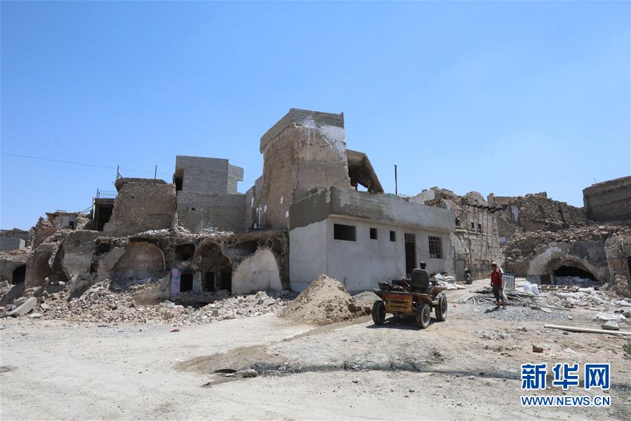 (國(guó)際·圖文互動(dòng))(6)通訊:中企員工愛(ài)心捐款助摩蘇爾老城民眾重燃生活希望