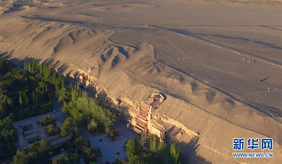 （時代先鋒&middot;圖文互動）（12）此生不悔入沙海 勇?lián)厝问家娊?mdash;&mdash;敦煌研究院文物保護(hù)利用群體群像