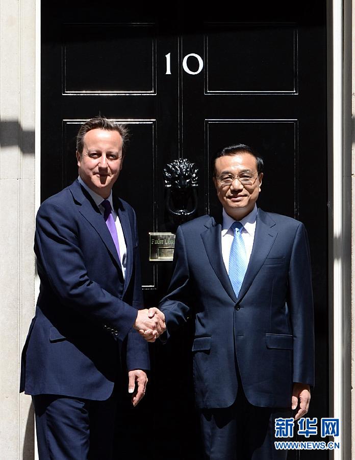 6月17日，國(guó)務(wù)院總理李克強(qiáng)在倫敦唐寧街10號(hào)首相府同英國(guó)首相卡梅倫舉行中英總理年度會(huì)晤。新華社記者 李濤 攝