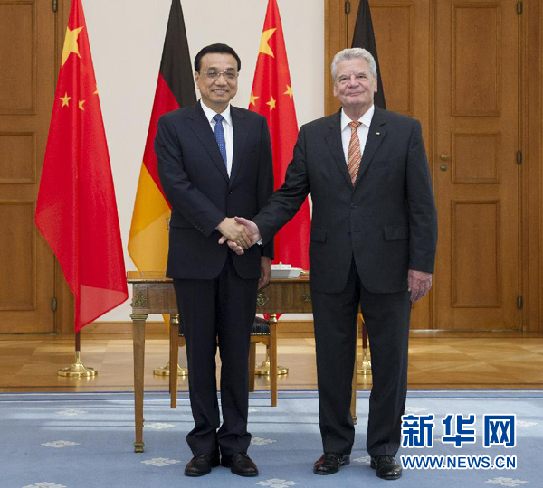 10月10日，國務(wù)院總理李克強(qiáng)在柏林會見德國總統(tǒng)高克。 新華社記者 王曄 攝 