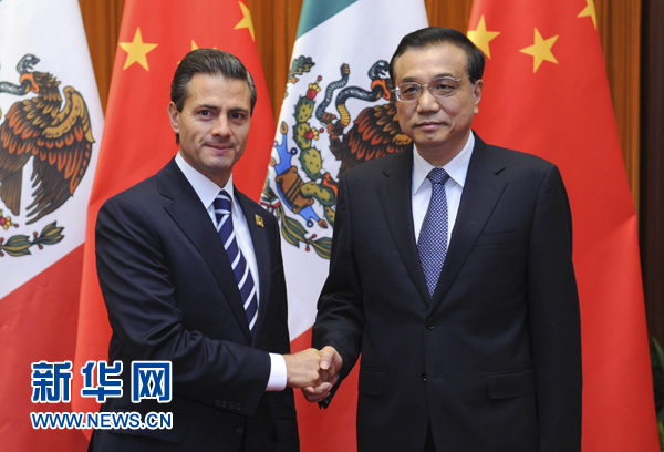 11月11日，國務院總理李克強在北京人民大會堂會見來華進行國事訪問并出席亞太經(jīng)合組織第二十二次領導人非正式會議的墨西哥總統(tǒng)培尼亞。新華社記者張鐸 攝 