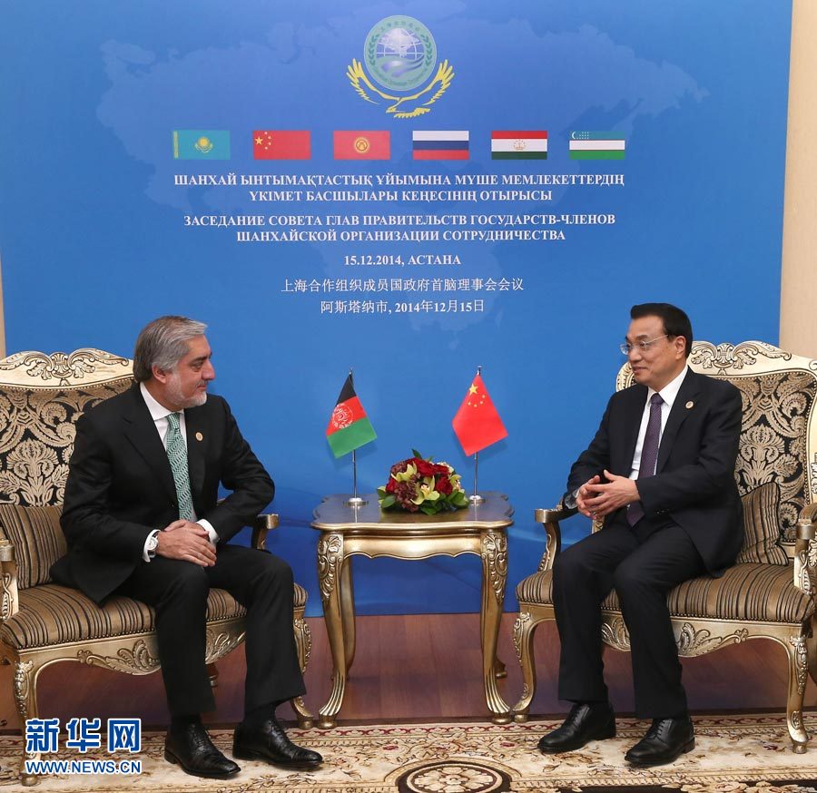 12月15日，中國國務(wù)院總理李克強(qiáng)在阿斯塔納會見阿富汗首席執(zhí)行官阿卜杜拉。 新華社記者 龐興雷 攝