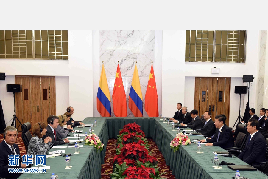 11月18日，國家主席習近平在菲律賓馬尼拉會見哥倫比亞總統(tǒng)桑托斯。 新華社記者 饒愛民 攝