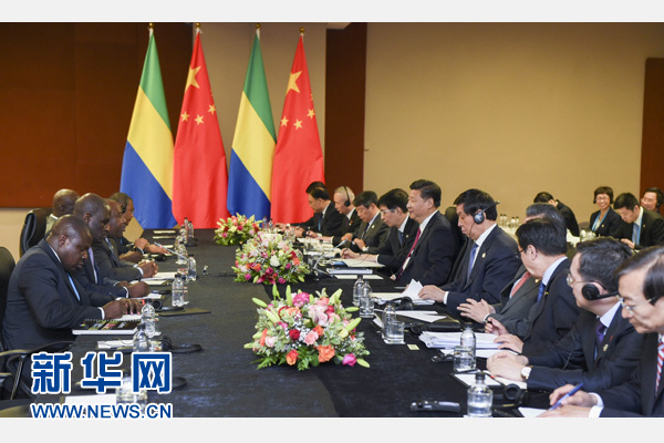 12月3日，國家主席習近平在約翰內斯堡會見加蓬總統(tǒng)邦戈。新華社記者 謝環(huán)馳 攝 