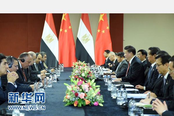12月4日，國家主席習(xí)近平在約翰內(nèi)斯堡會見埃及總理伊斯梅爾。新華社記者 張鐸 攝 
