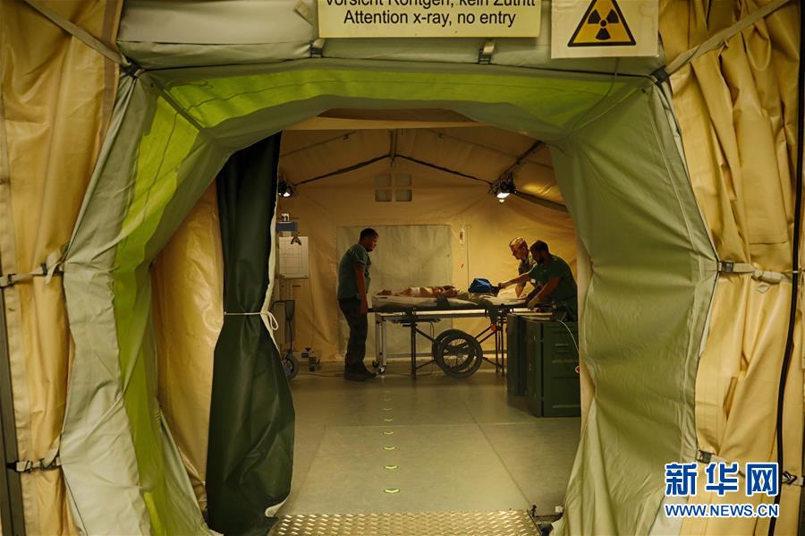 （國際&middot;圖文互動）（1）&ldquo;共同的理念，讓合作更深入更順暢&rdquo;&mdash;&mdash;走進中德&ldquo;聯(lián)合救援-2019&rdquo;衛(wèi)勤實兵聯(lián)合演習(xí)德方野戰(zhàn)二級醫(yī)院